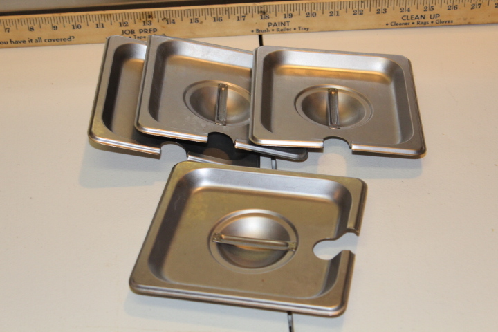 lot 102 image: 16 pan lids