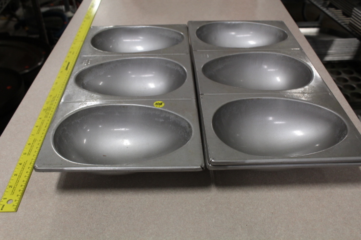 lot 105 image: Egg cake form pans