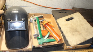 lot 391 image: Welding Helmet  Kneeing Pads  Caulking Guns Lot