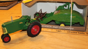 lot 30 image: John Deere 50th Anniversary Combine and Oliver Row Crop 77 Tractor