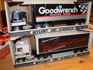 lot 48 image: Goodwrench Racing Team and Mr. Goodwrench 18-Wheeler Steel Trucks - NIB