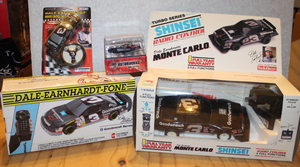 lot 90 image: Dale Earnhardt Remote Control Cars and Phone Lot