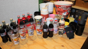 lot 108 image: NASCAR Racing Soda Bottles  Glasses  Plastic Cups  Insulated Can Holders