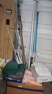lot 155 image: Curtains  Curtain Rods  Shower Curtains  Shears  Bathroom Rugs and Decor Lot  (Garage)