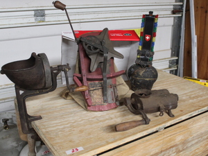 lot 189 image: Vintage Cow Bell  Vintage Seeder  Vintage Tobacco Cutter  Vintage Vegetable Slicer  (Garage)