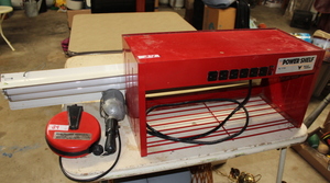 lot 24 image: Retractable Shop Work Light  Fluorescent Light  Power Shelf  (Garage)