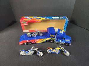 lot 62 image: 2006 Racing Bike and Transporter  2 extra choppers Sunoco