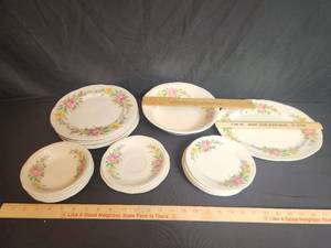 lot 34 image: 23 piece lot of Homer Laughlin China dishes have wear