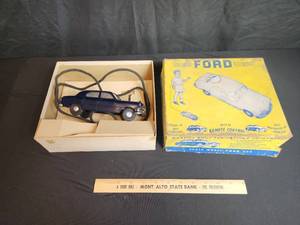 lot 36 image: Vintage Remote control card Ford untested
