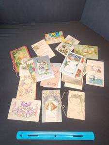 lot 23 image: Lot of Vintage  early 1900s Christmas Postcards a lot with writing on back