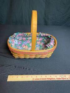 lot 144 image: 1997 Longaberger Easter Basket with Easter Fabric Liner (1signature)