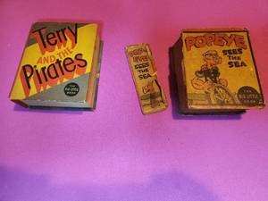 lot 56 image: 2 big little books Popeye Sees the Sea ( poor condition) and Terry and the Pirates