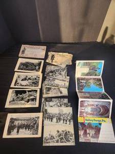 lot 64 image: Large lot of early 1900s Post cards and other cards lots with writing on them