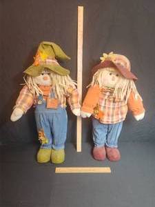 lot 103 image: Harvest Kids dcor  by Kmart 2 scarecrows