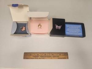 lot 27 image: Avon pins  with boxes