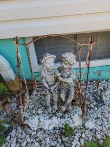 lot 123 image: Children sitting on bench yard ornament