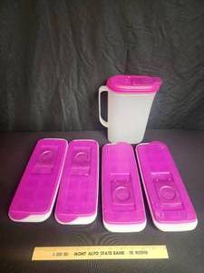 lot 16 image: Tupperware 4 ice trays and storage container with matching purple lids