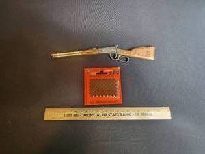 lot 41 image: Toy Lever action mini rifle and caps