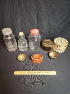 lot 44 image: Glass jars and tins