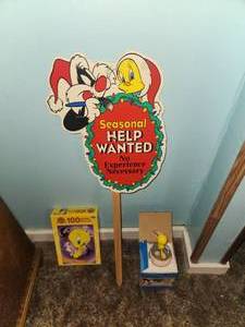 lot 89 image: Tweety yard sign, puzzle and collectable