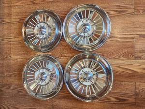 lot 16 image: lot of 4 late 50s Ford Hubcaps
