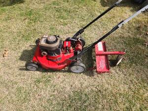 lot 5 image: Snapper push mower and rake attachment. Runs and self propelled