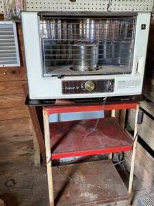 lot 55 image: Kerosene Heater (untested) and Cart (cart in poor condition)