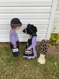 lot 76 image: Amish Boy and Girl and Mushroom Yard Ornaments