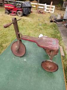 lot 27 image: Old Kiddie Kar Pedal toy  bike