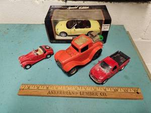 lot 14 image: Lot of 4 toy vehicles
