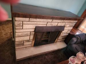 lot 54 image: Old fake fire place with record player, radio and 8 track player. Tested