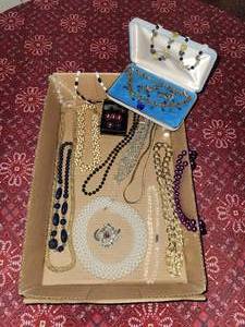lot 92 image: Necklaces and match clip on earing and necklace set  Assorted Costume Jewelry