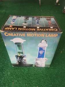 lot 144A image: Creative Motion Lamp Polar Scene