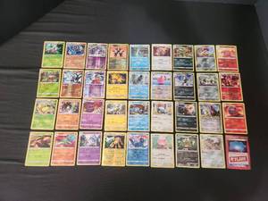 lot 26 image: Lot of 36 Different Foil Rare Pokmon Cards.  Mixed years and sets.