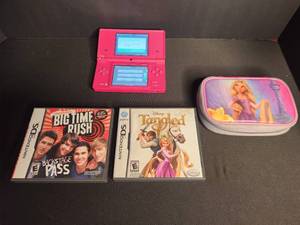 lot 6 image: Pink DSi with 2 games and case. Screen has some spots the dont pick up touch motion