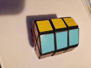 lot 49 image: Vintage Rubik cube style game missing 1 sticker square.