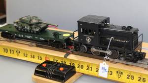 lot 146 image: United States Army Transportation Corps Switcher Engine  &  U.S. Army Flat Car with Camouflage Tank Load