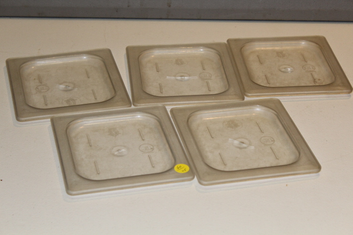 lot 60 image: 16 pan lids