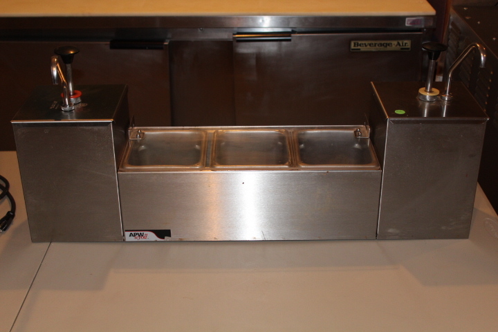 lot 22 image: APW Wyott condiment dipenser