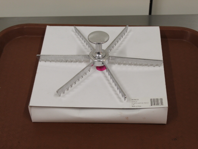 lot 114 image: Pie  Cake Cutter - NEW