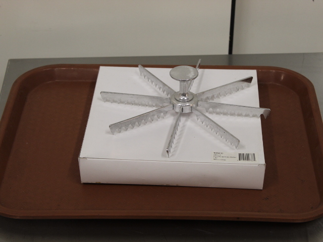 lot 115 image: Pie  Cake Cutter - NEW