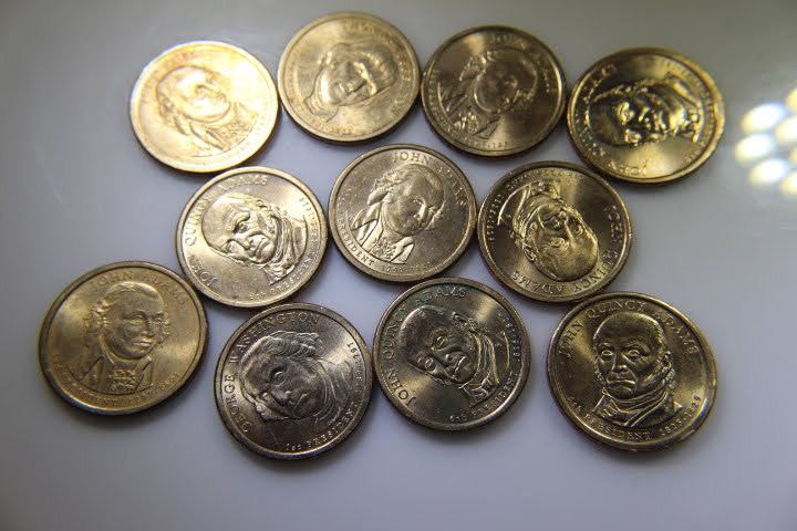 lot 126 image: 11 Presidential Dollars
