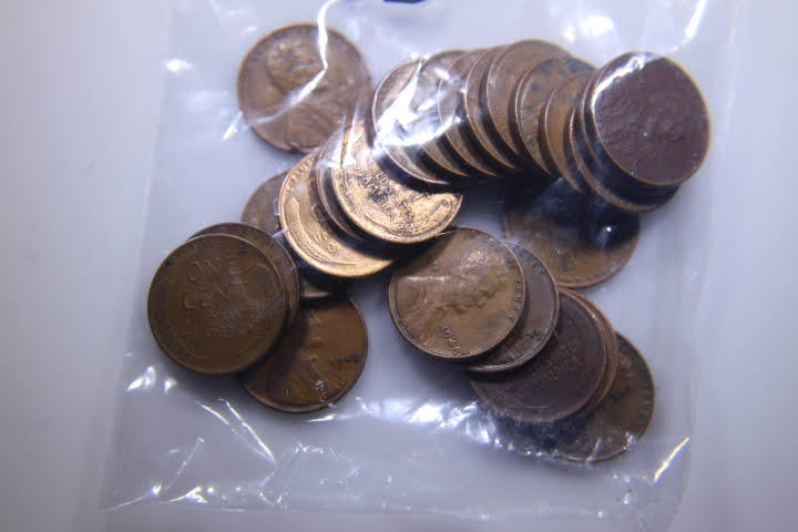 lot 163 image: 24 Wheat Pennies