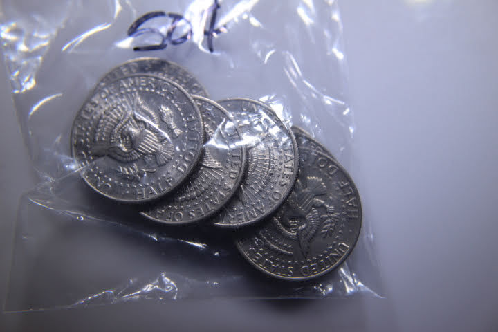 lot 167 image: 7 1974 JFK 50 Cent 12 Dollar