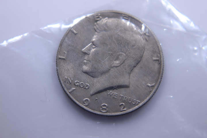 lot 172 image: 1- 1982-P JFK 50 Cent 12 Dollar