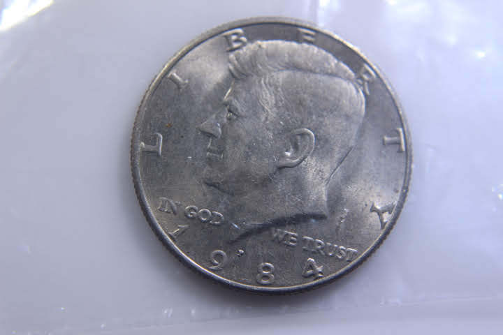 lot 174 image: 1984 -P JFK 50 Cent 12 Dollar