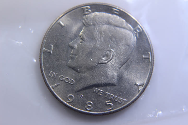 lot 175 image: 1985 - D JFK 50 Cent 12 Dollar