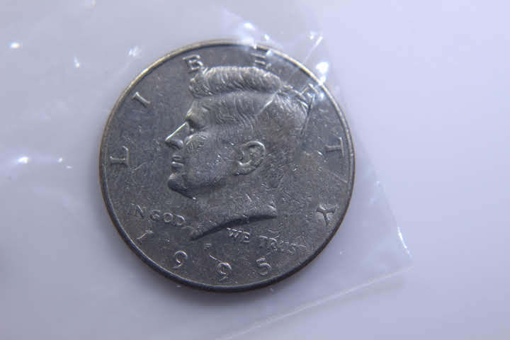 lot 182 image: 1-1995-P JFK 50 Cent 12 Dollar