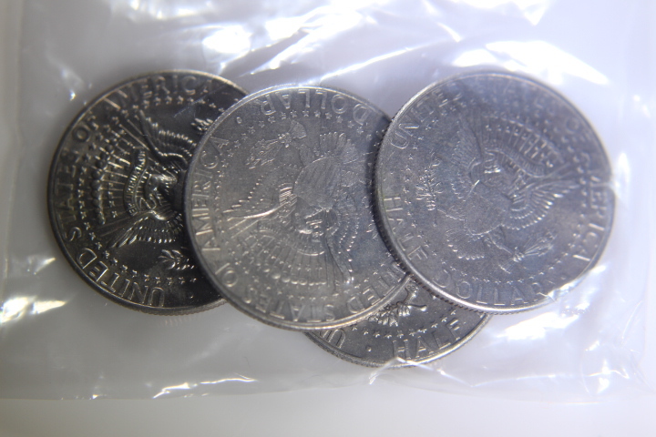 lot 41 image: 4- Kennedy Half Dollars 50C