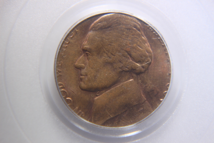 lot 3B image: MINT ERROR 1980 P Nickle Struck on Cent Planchet PCGS 64RB Graded by PCGS in Slab